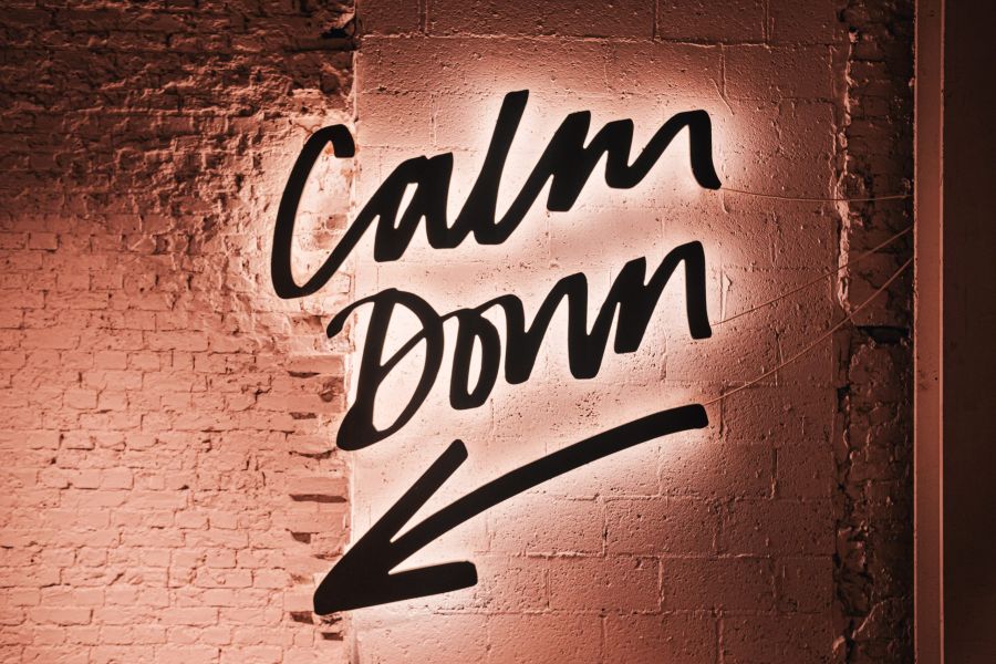 Image of a wall with calm down written on it